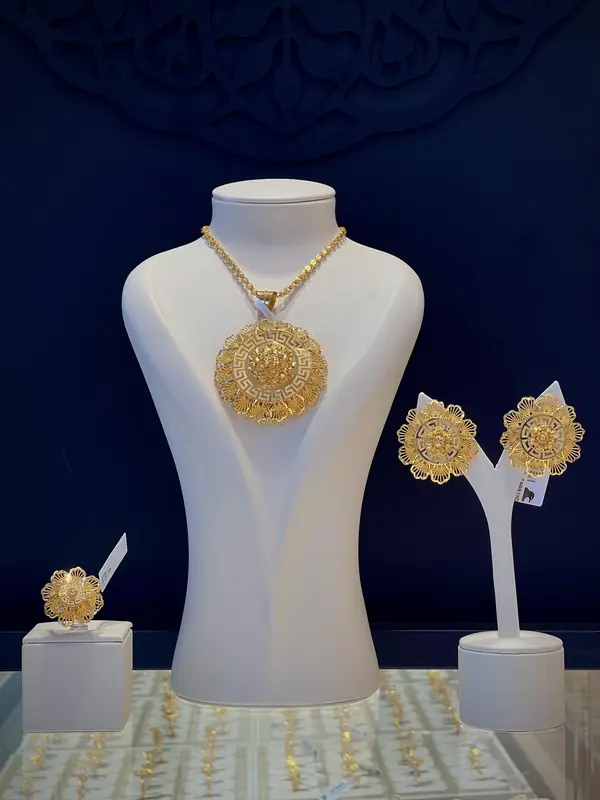 Medallion pendant set with earrings and ring